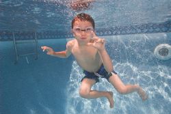 My son in the pool in early April he froze so Daddy could... by Michael Shope 
